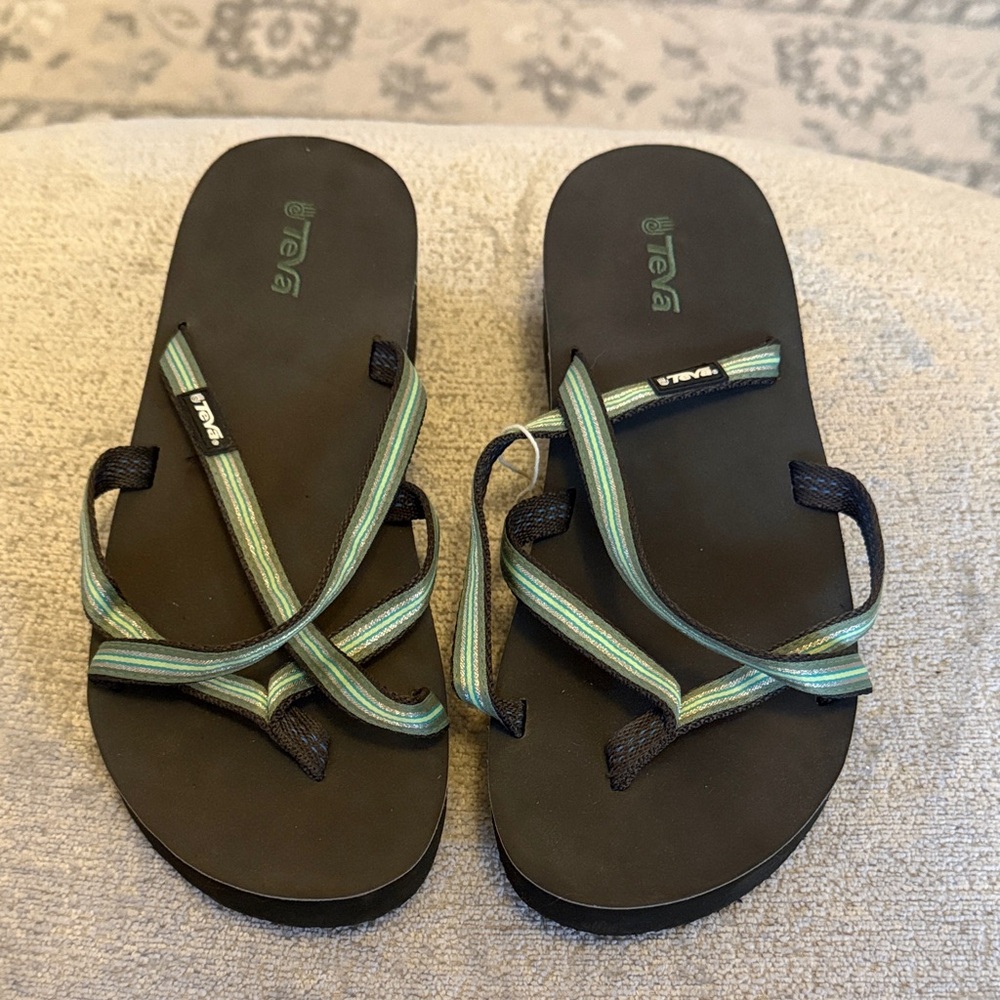 Teva Black Footbed Sandals with Green and Rose Gold Striped Straps